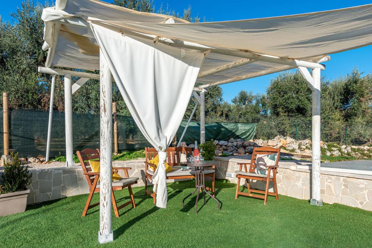 Trullo Delle Ginestre Private Pool - Happy Rentals view 2