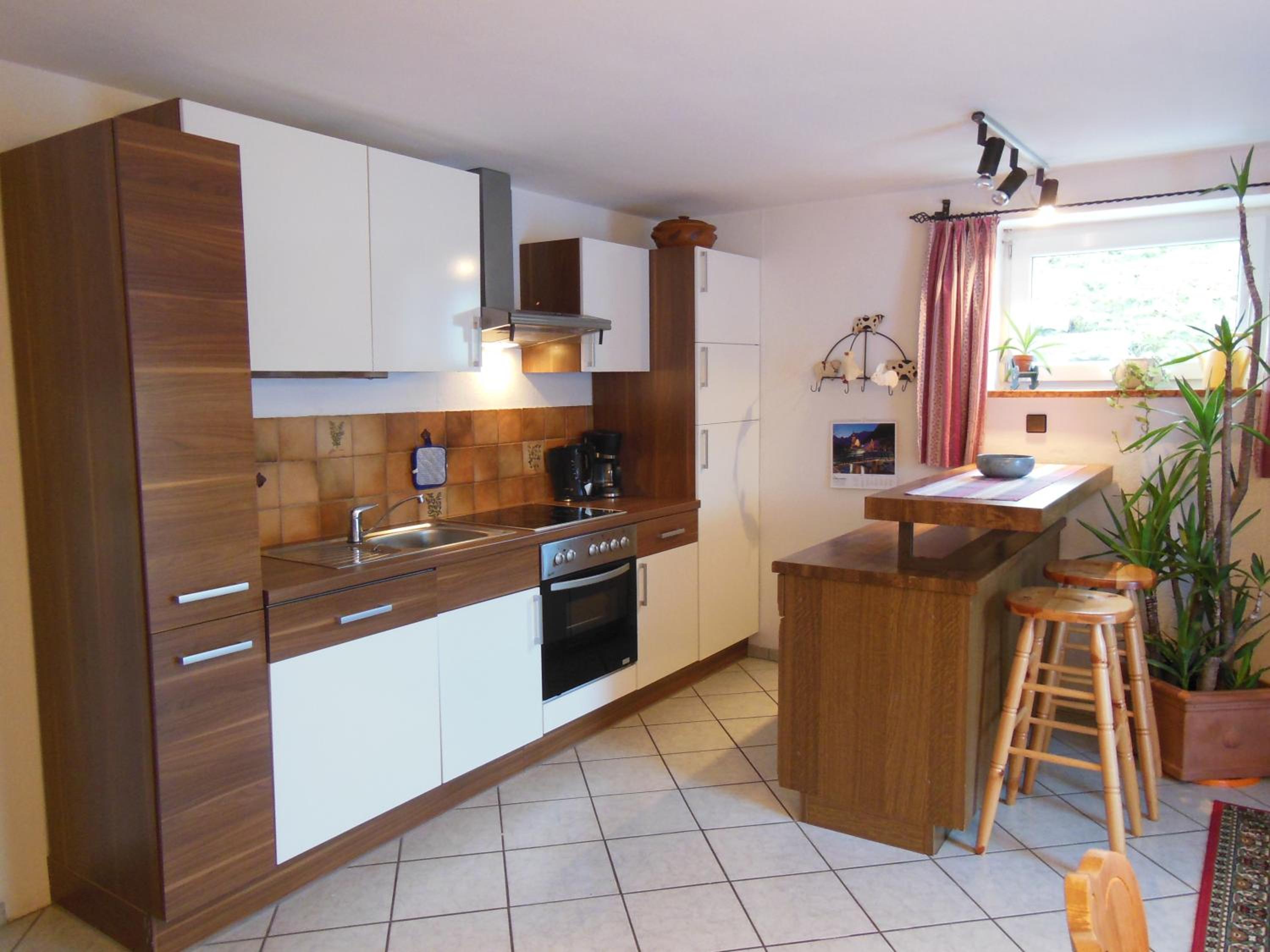 Appartement im Souterrain mit Terrasse