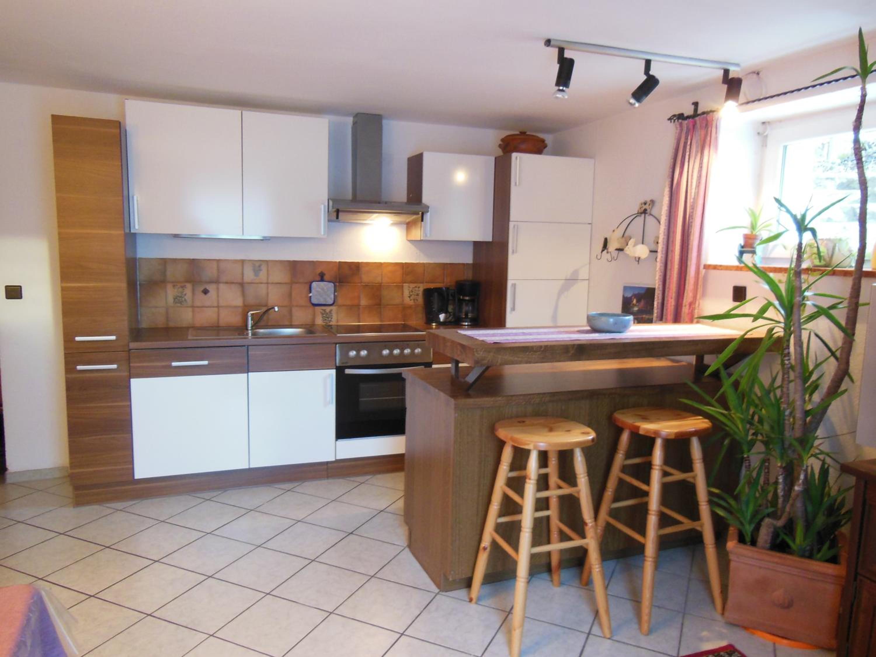 Appartement im Souterrain mit Terrasse
