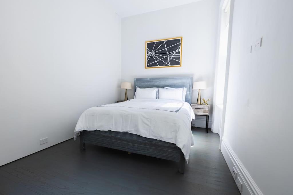 E10-2 Designer East Village Townhouse 1BR W D