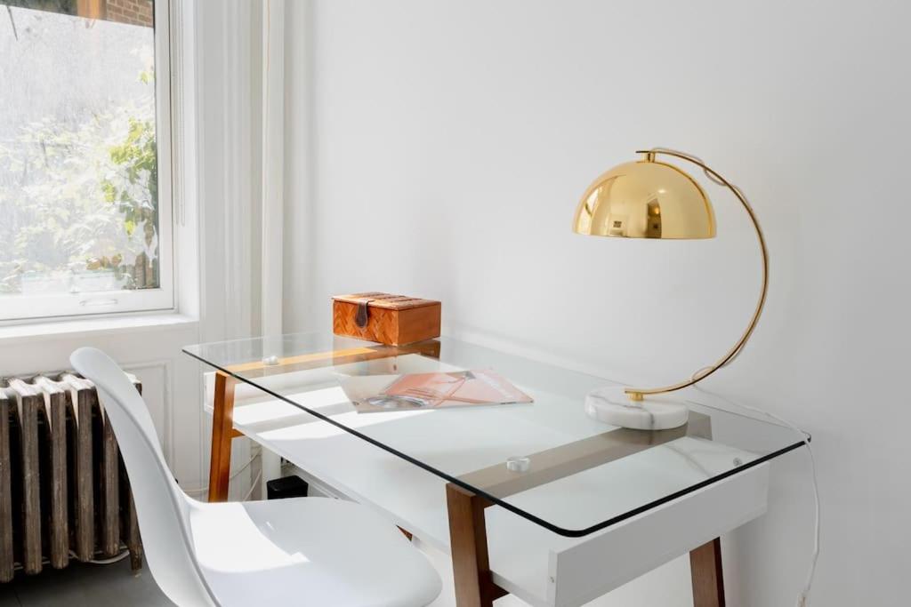 E10-2 Designer East Village Townhouse 1BR W D