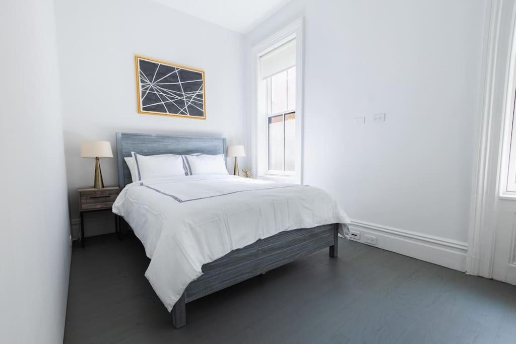 E10-2 Designer East Village Townhouse 1BR W D