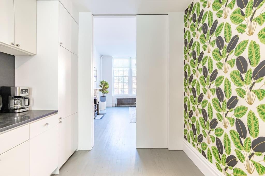 E10-2 Designer East Village Townhouse 1BR W D