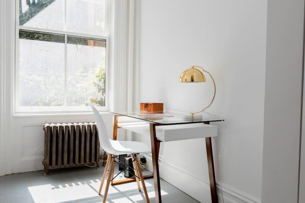 E10-2 Designer East Village Townhouse 1BR W D
