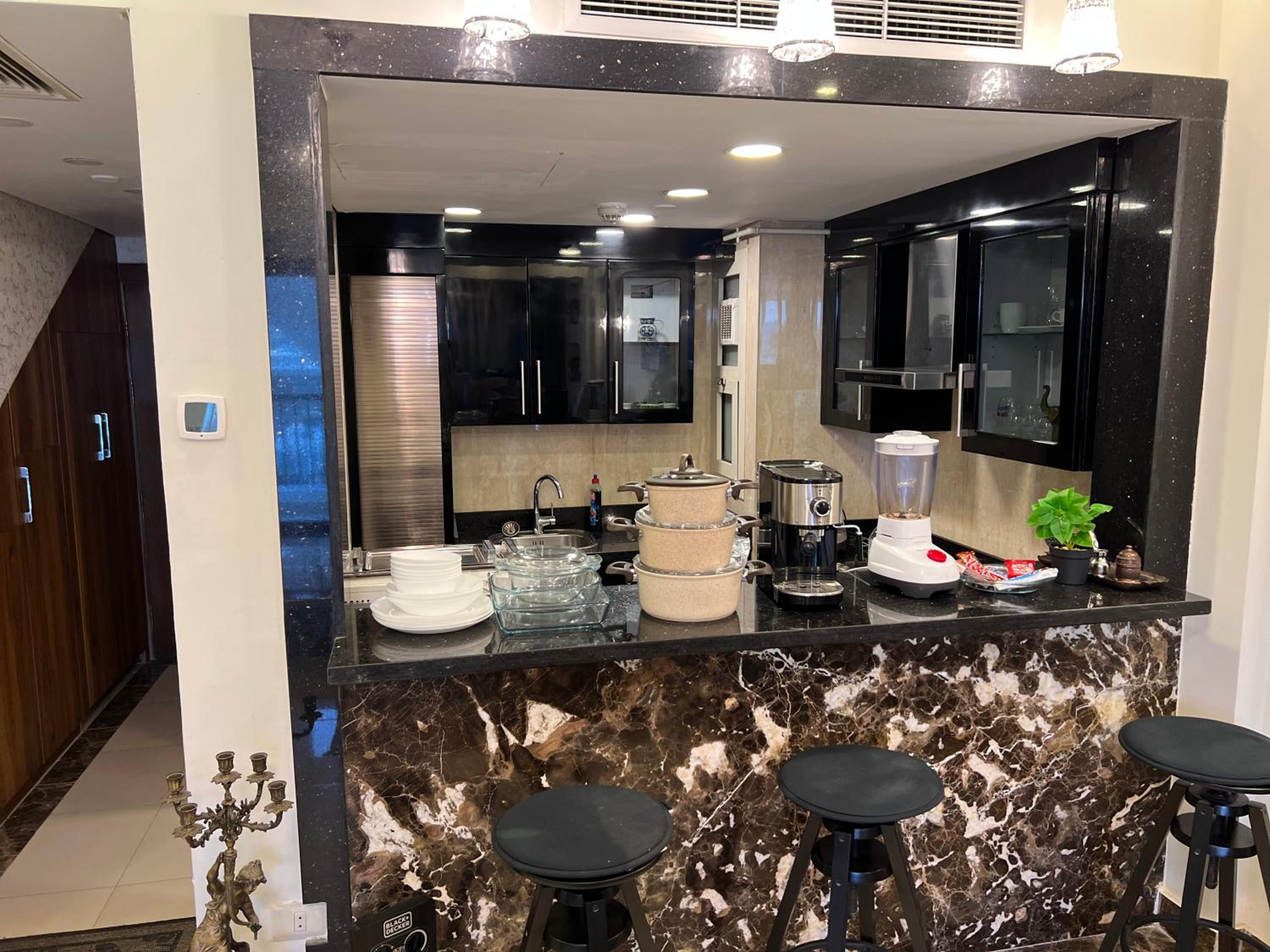 Luxury hotel apartment with pools in front AUC