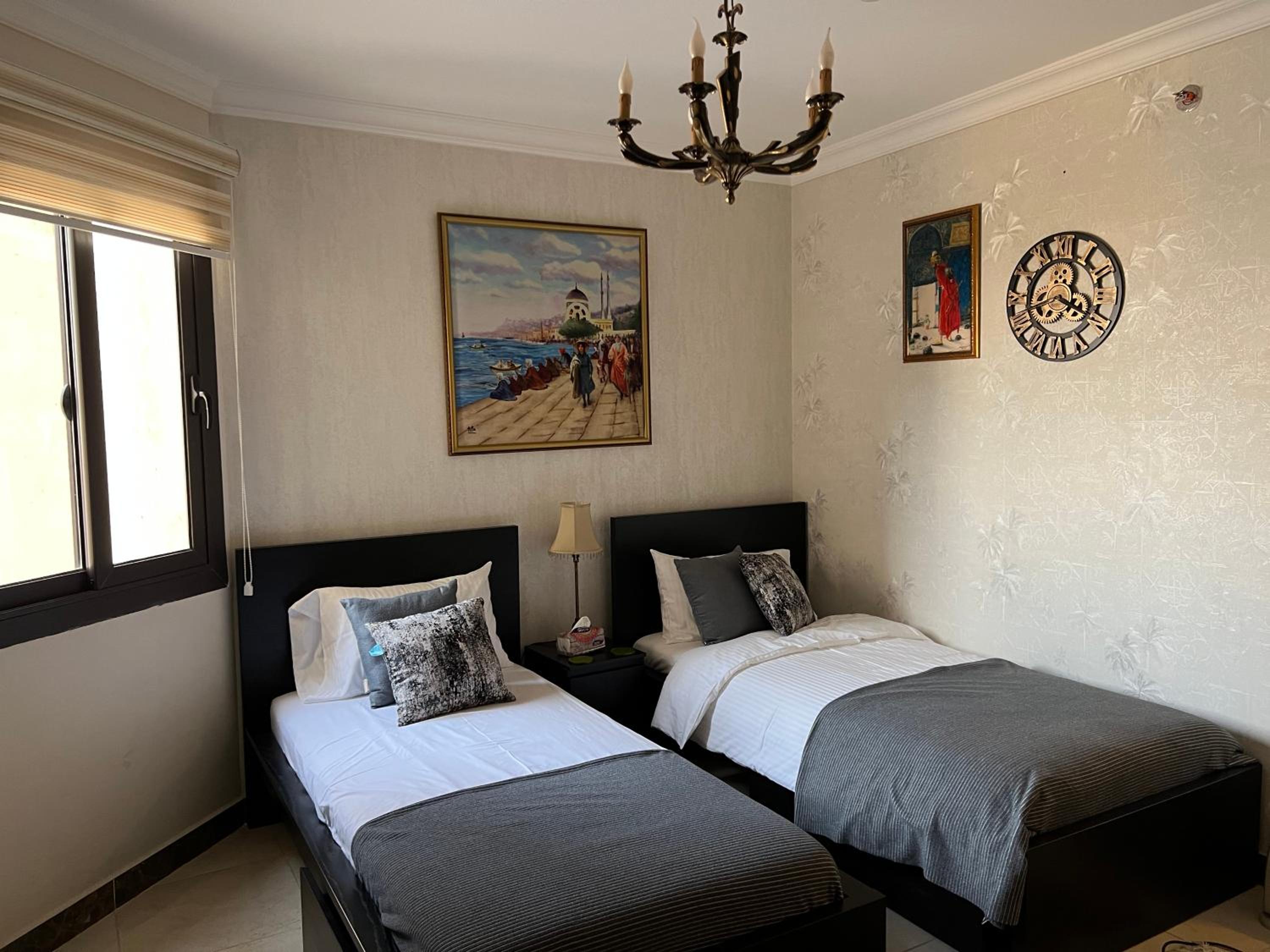 Luxury hotel apartment with pools in front AUC