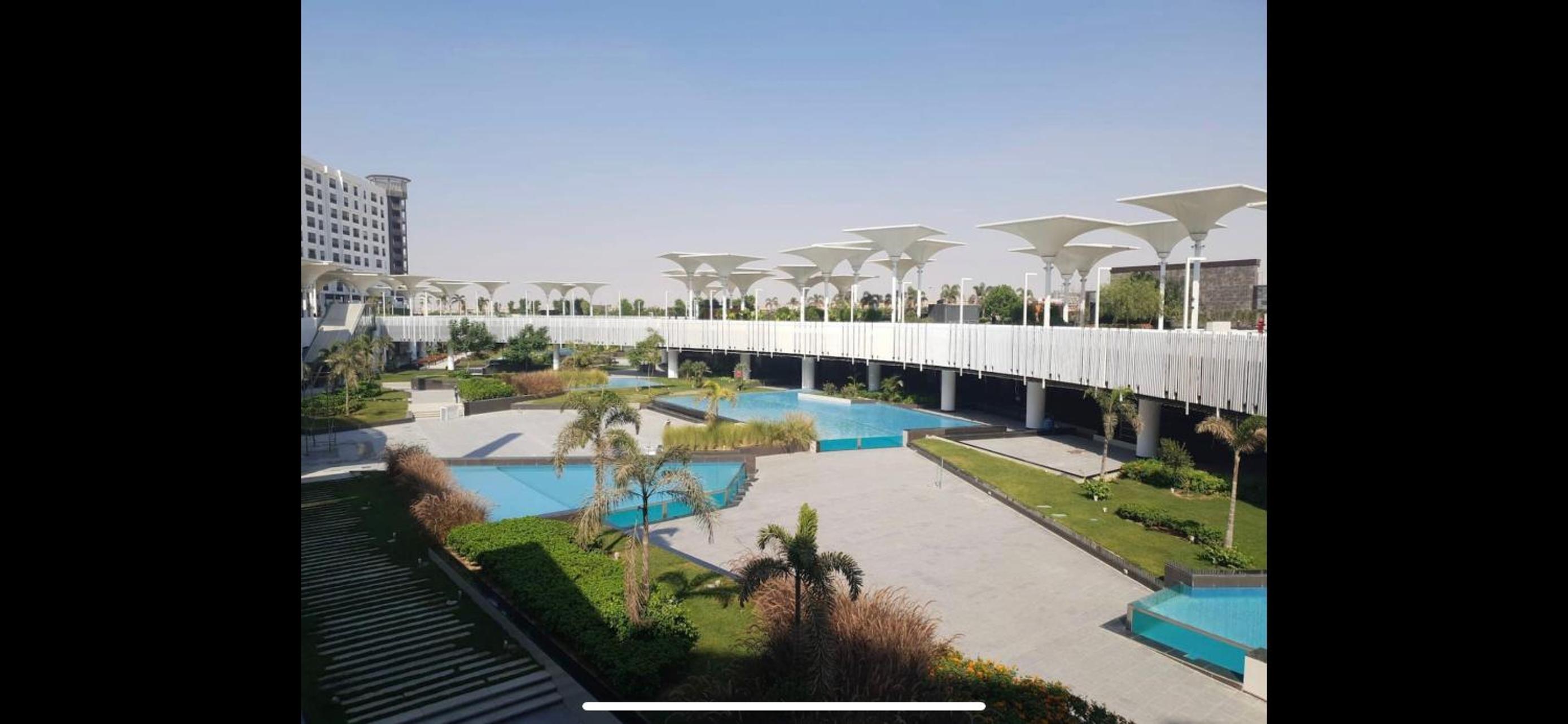 Luxury hotel apartment with pools in front AUC