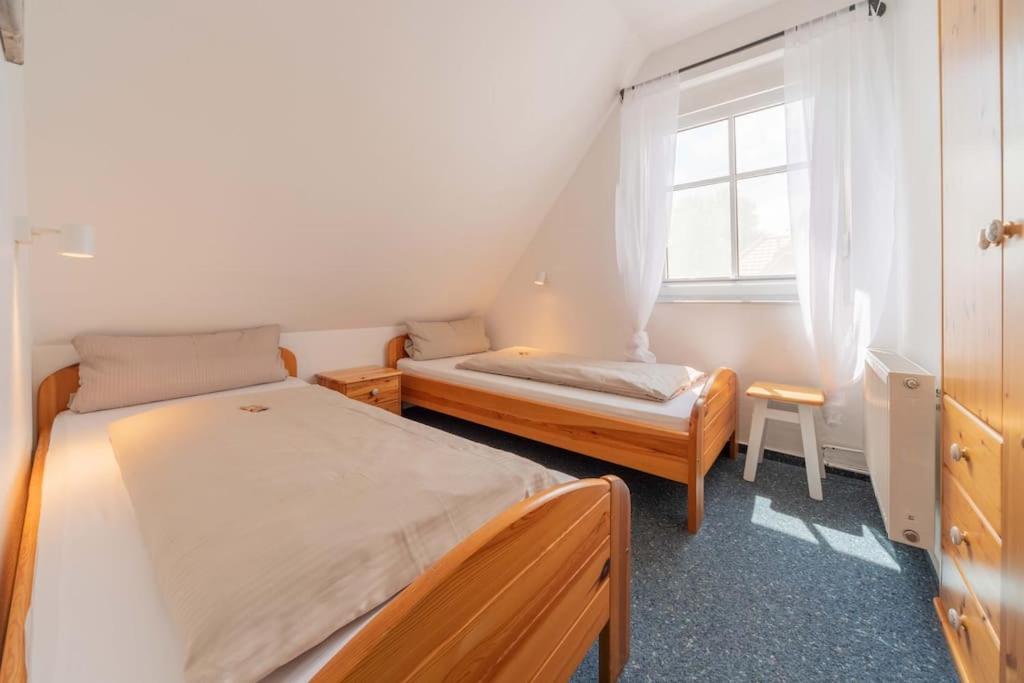 Ferienwohnung Lüttje Huck - Seeblick 1