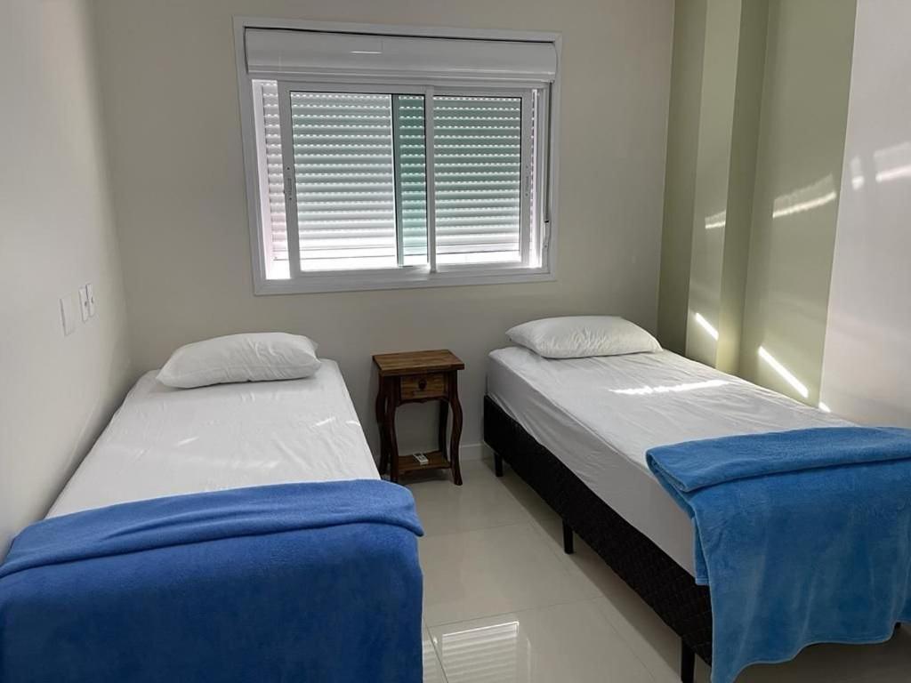 1053 - Praia de Bombinhas locação de temporada - Residencial Egídio Pinheiro Apto 302 B