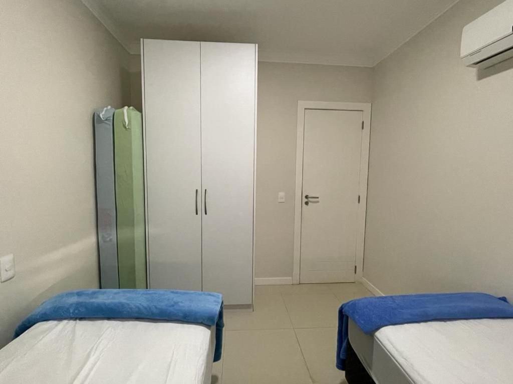 1053 - Praia de Bombinhas locação de temporada - Residencial Egídio Pinheiro Apto 302 B