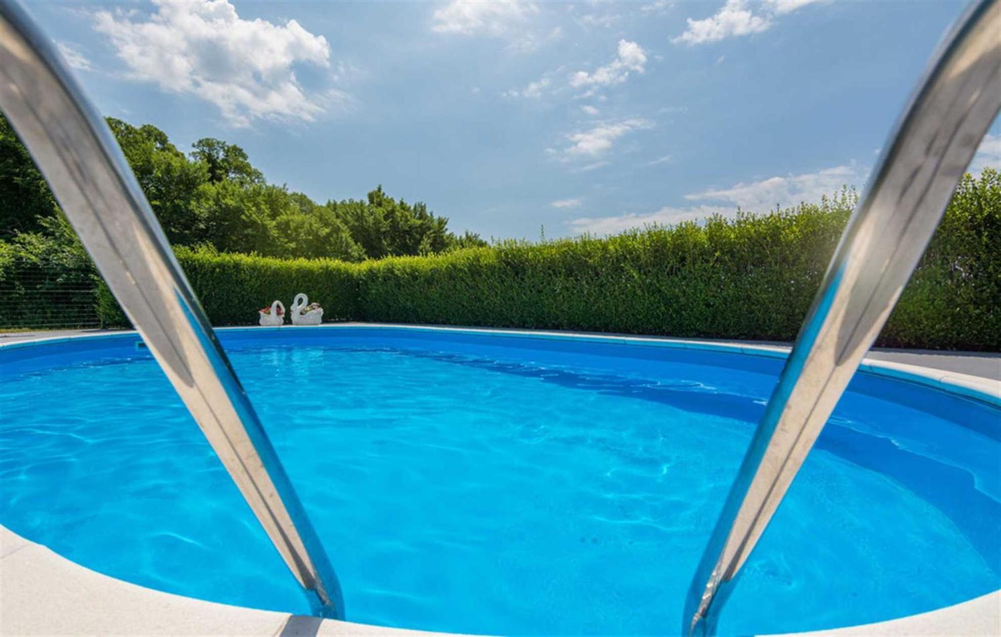 Holiday Home Flora with pool view 4