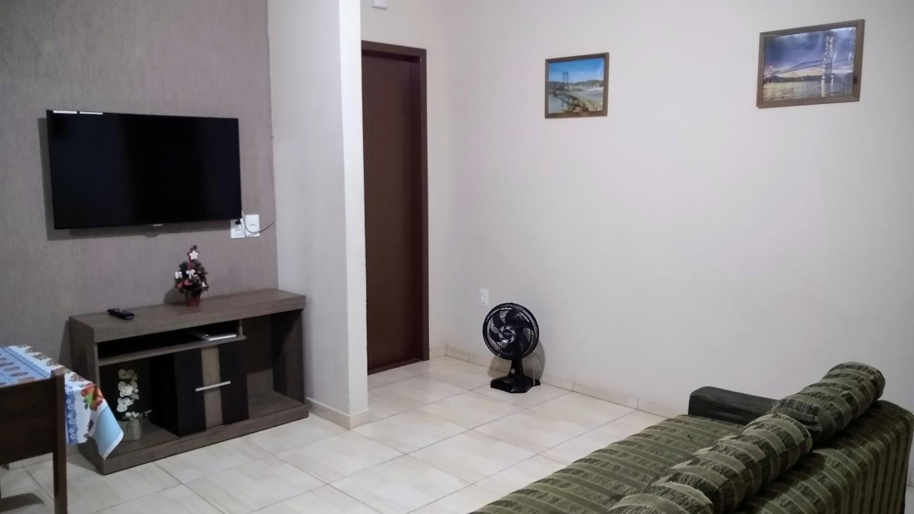 Apto jeito de casa entre mar e montanha AR