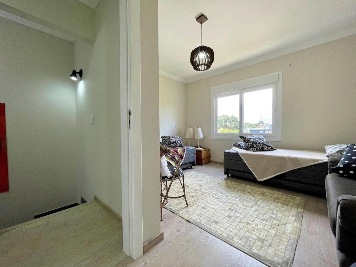 Casa TRIPLEX 3 dorm a 6QD RUA COBERTA CANELA