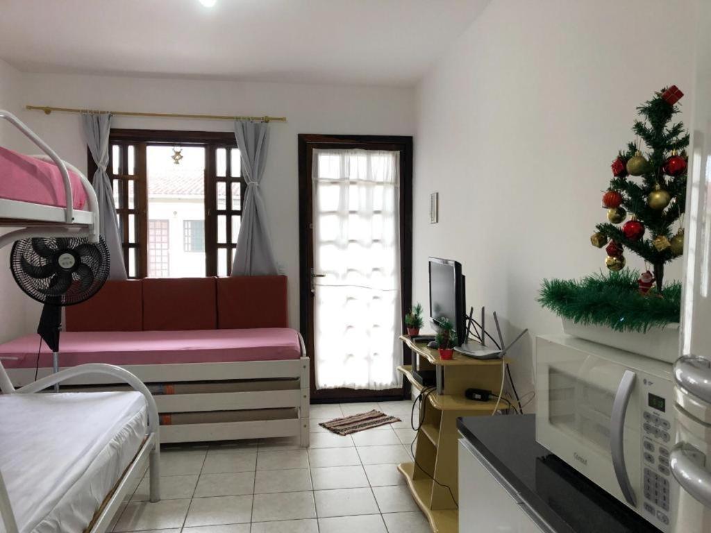 250m da praia-Kitinete com Piscina-Matinhos-PR