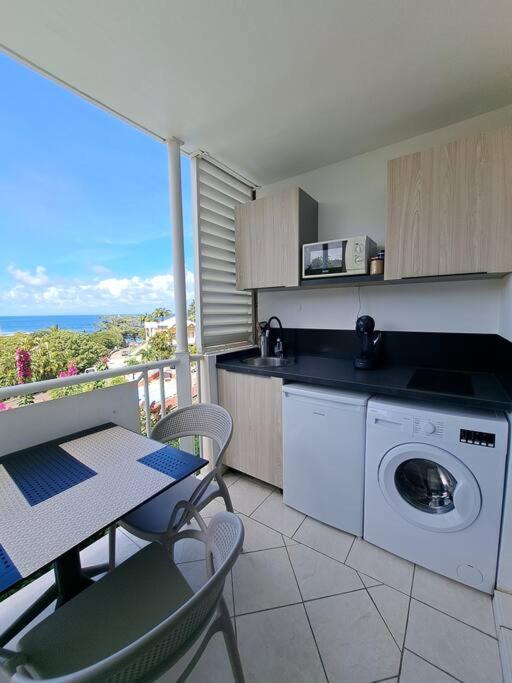 Appartement vue mer, résidence avec piscine à Tartane