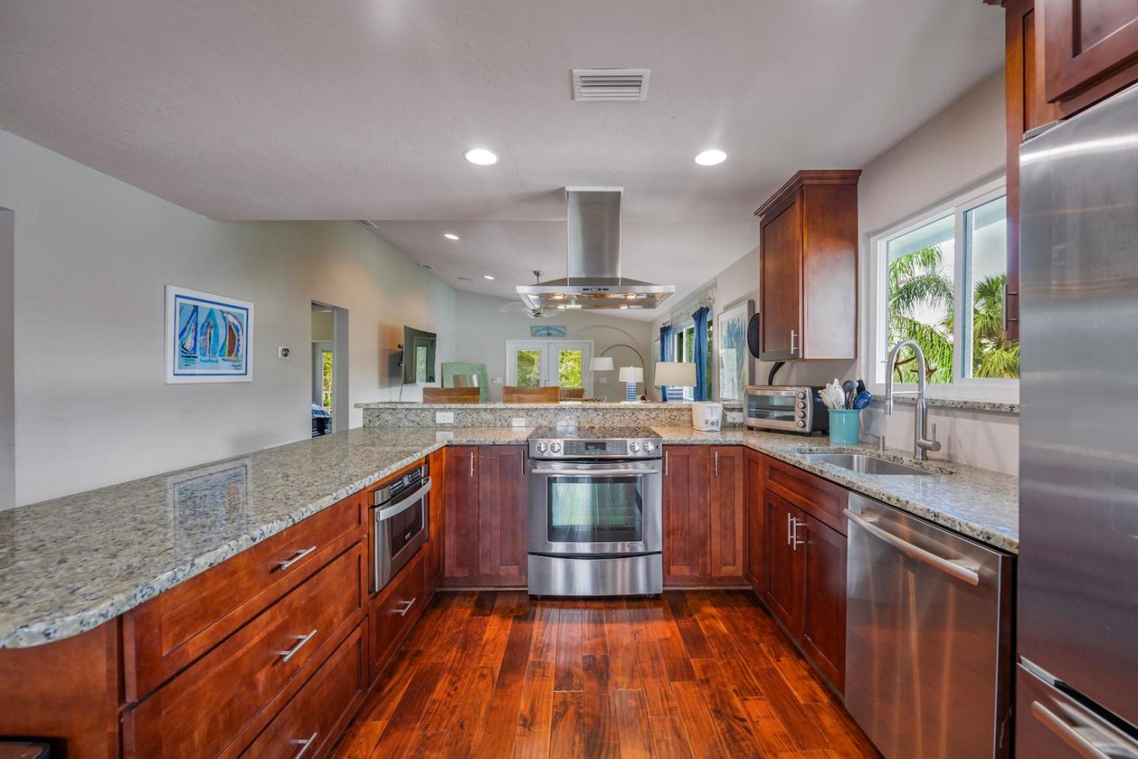 Decked Out - Stunning Home Huge Sunny Resort Style Heated Pool Walk to Pine Ave Beach view 5