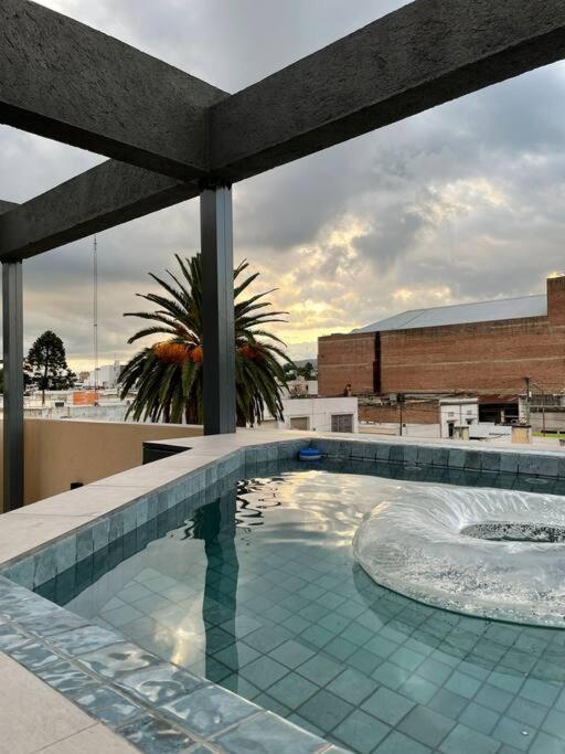 LUMINOSO piso con jacuzzi