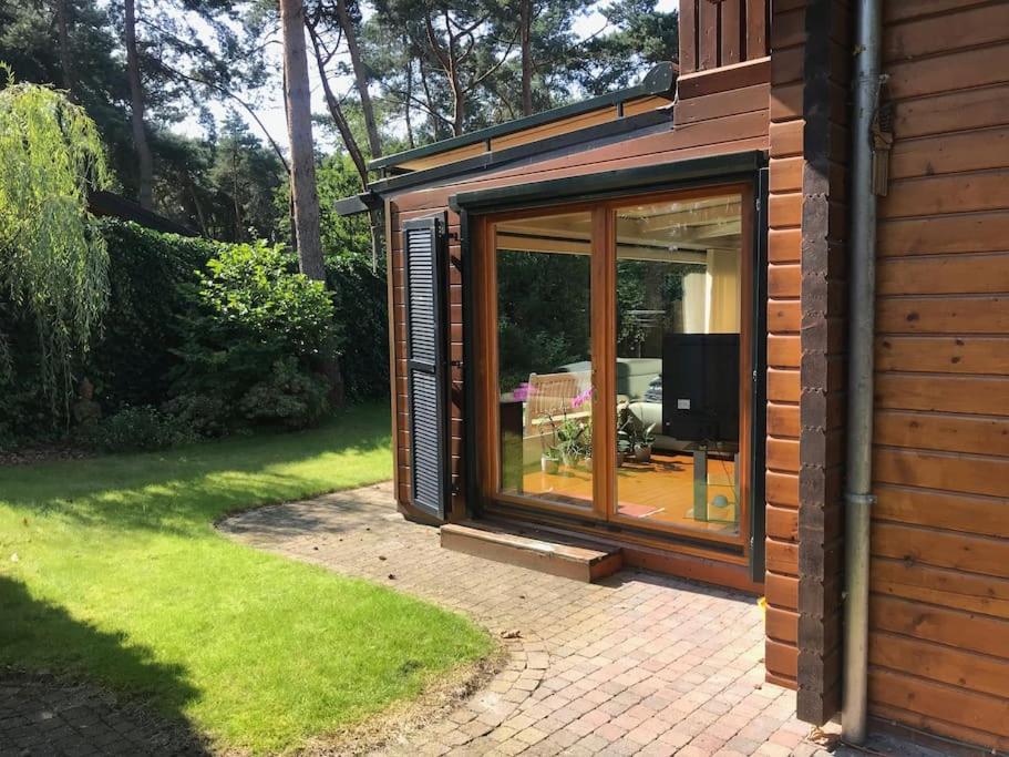 Houten chalet/bungalow in het bos, sauna, jacuzzi view 5