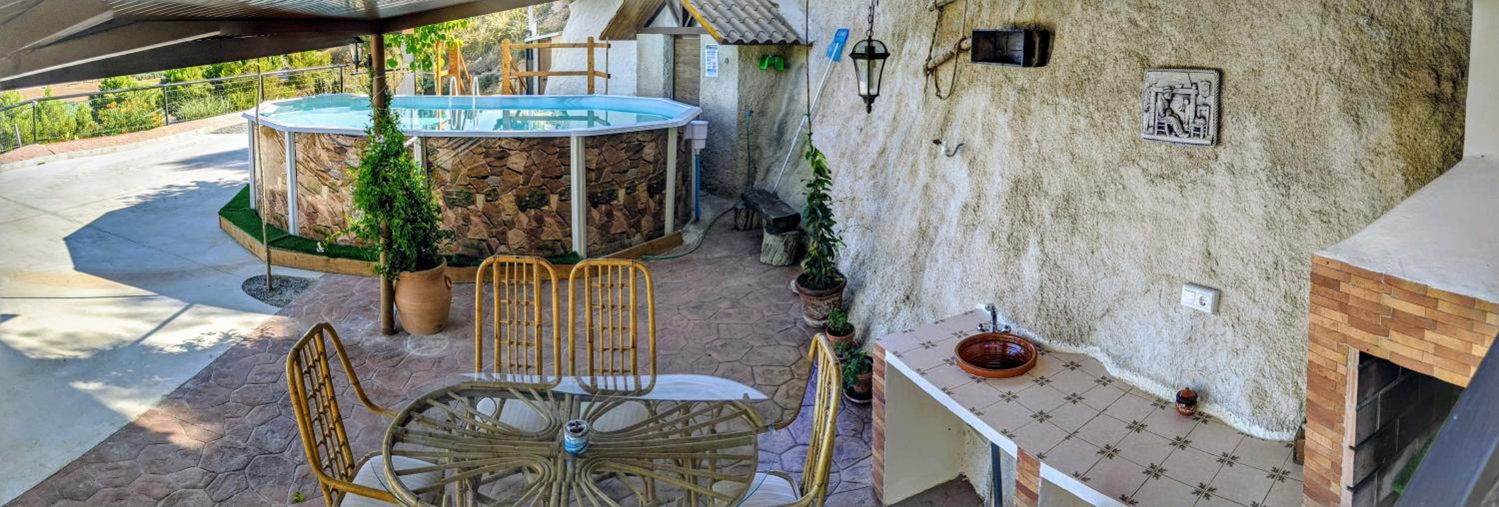 Casas Cueva con piscina y barbacoa