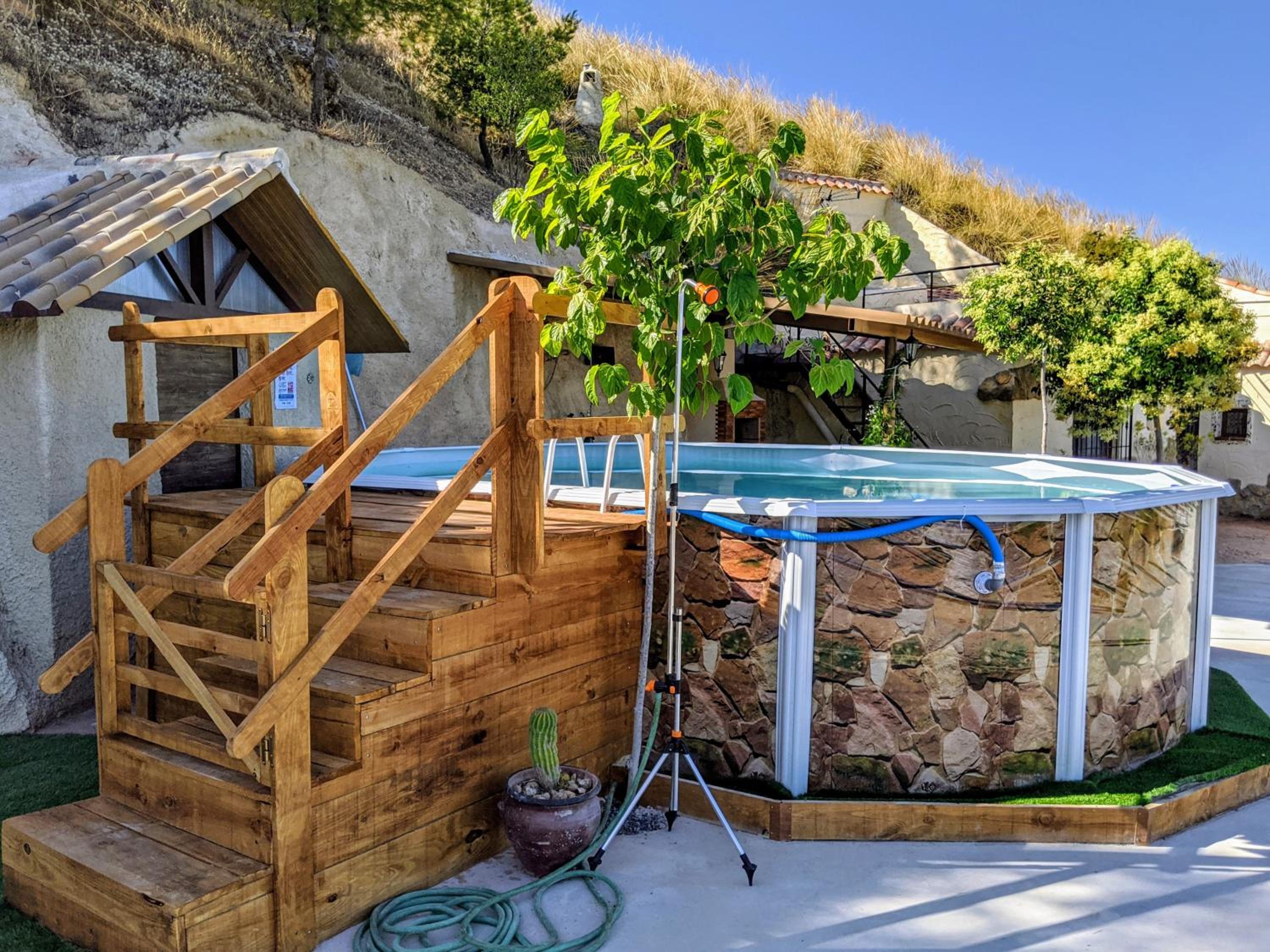 Casas Cueva con piscina y barbacoa