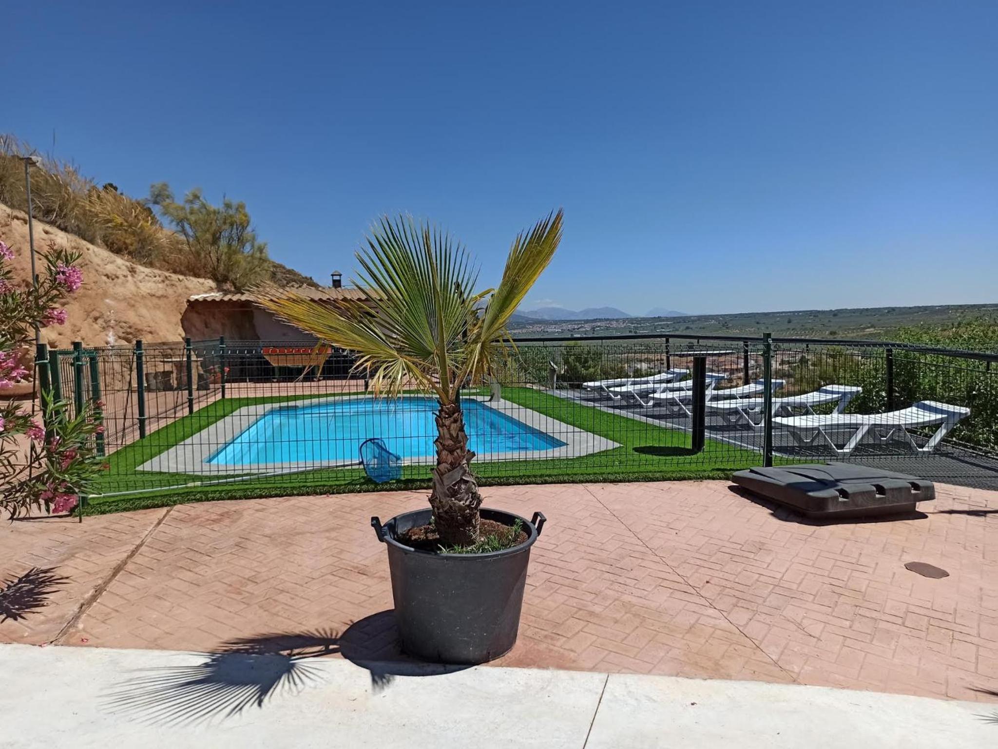 Casas Cueva con piscina y barbacoa