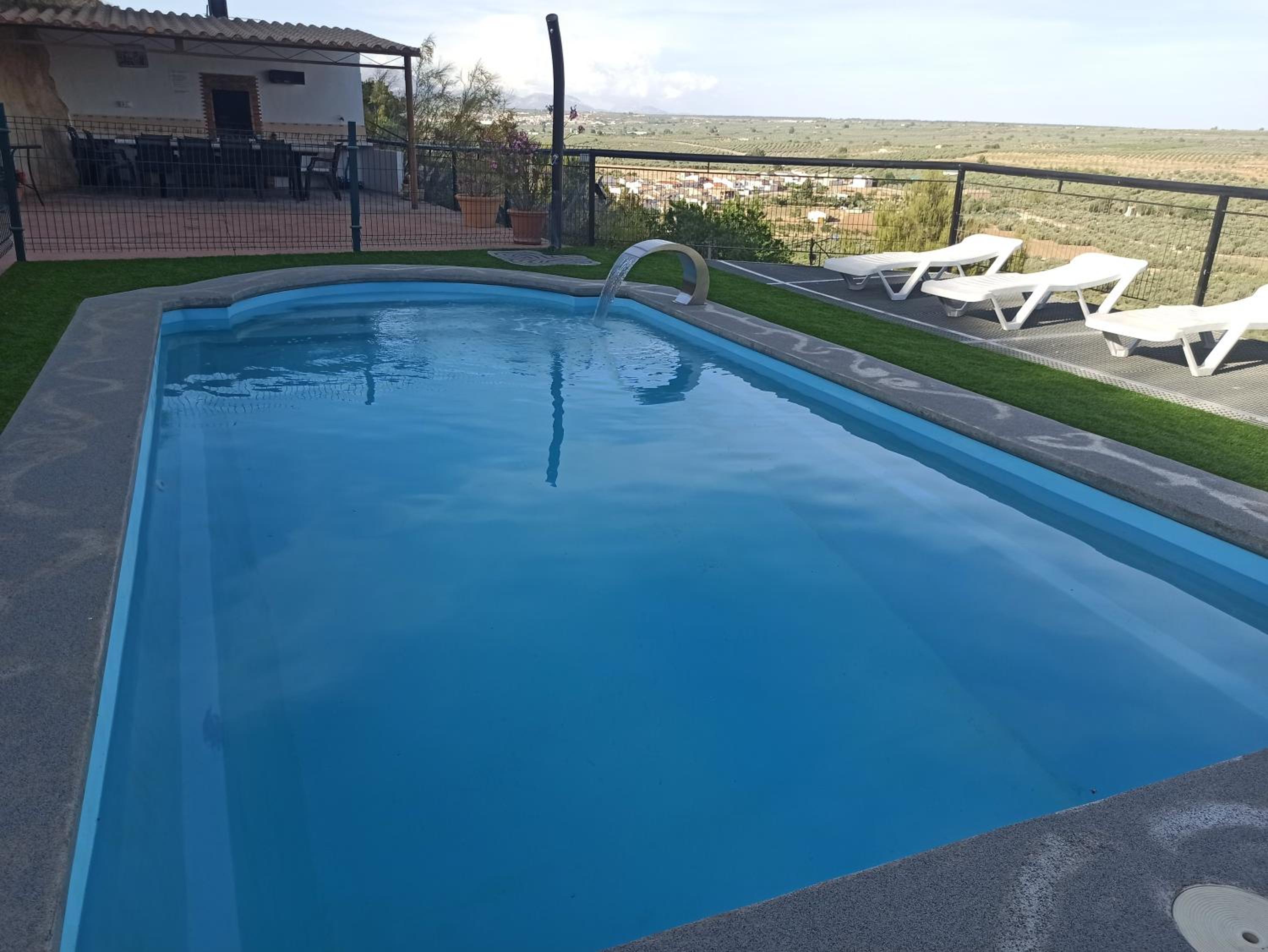 Casas Cueva con piscina y barbacoa