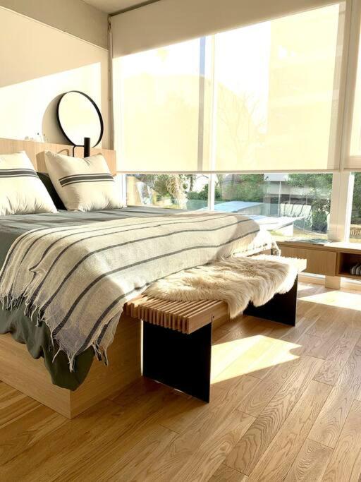 Stylish Apartment by River with Pool & Grill