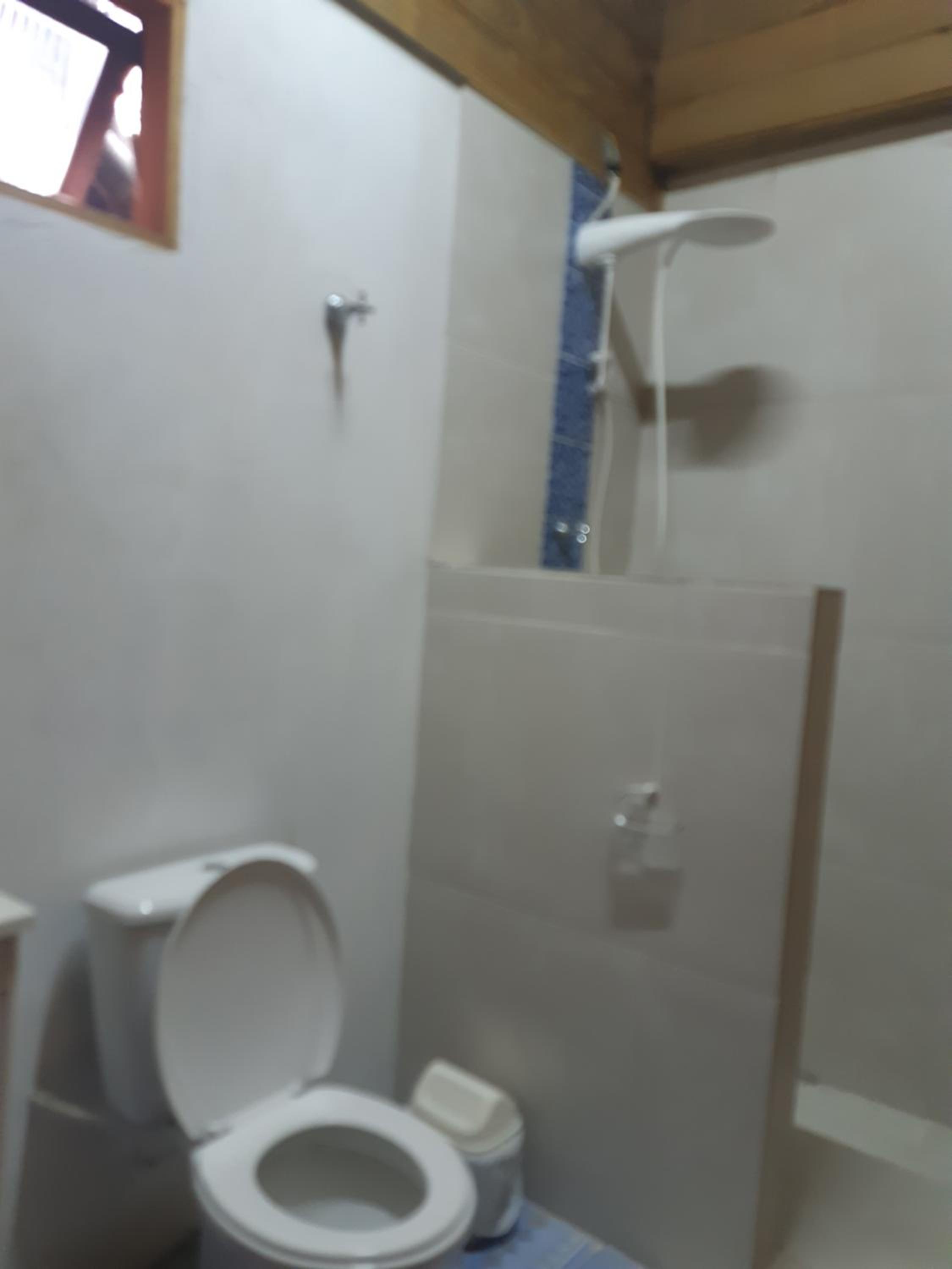 Casa Rústica praia da Ferrugem próximo praia com piscina compartilhada