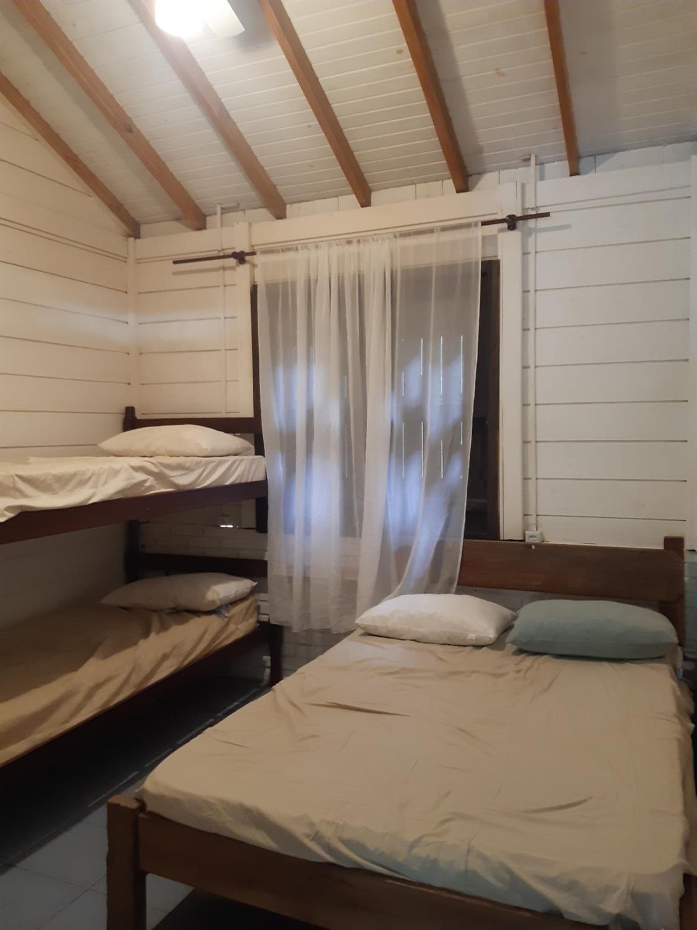 Casa Rústica praia da Ferrugem próximo praia com piscina compartilhada