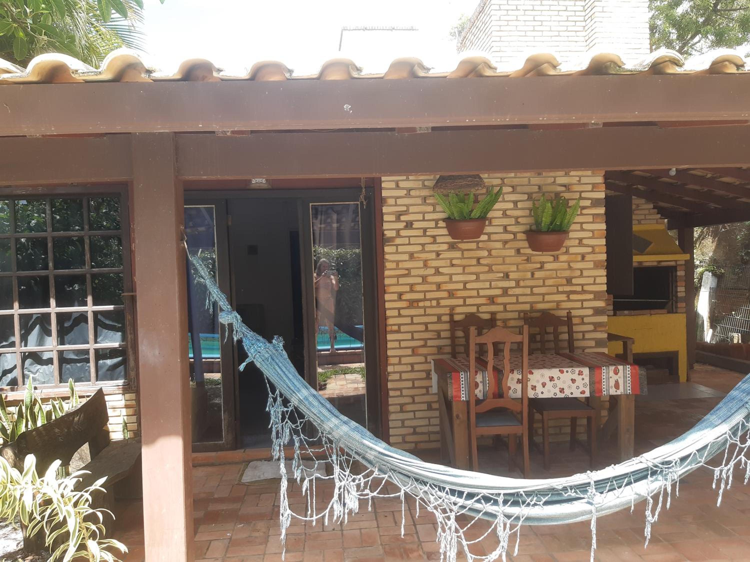 Casa Rústica praia da Ferrugem próximo praia com piscina compartilhada