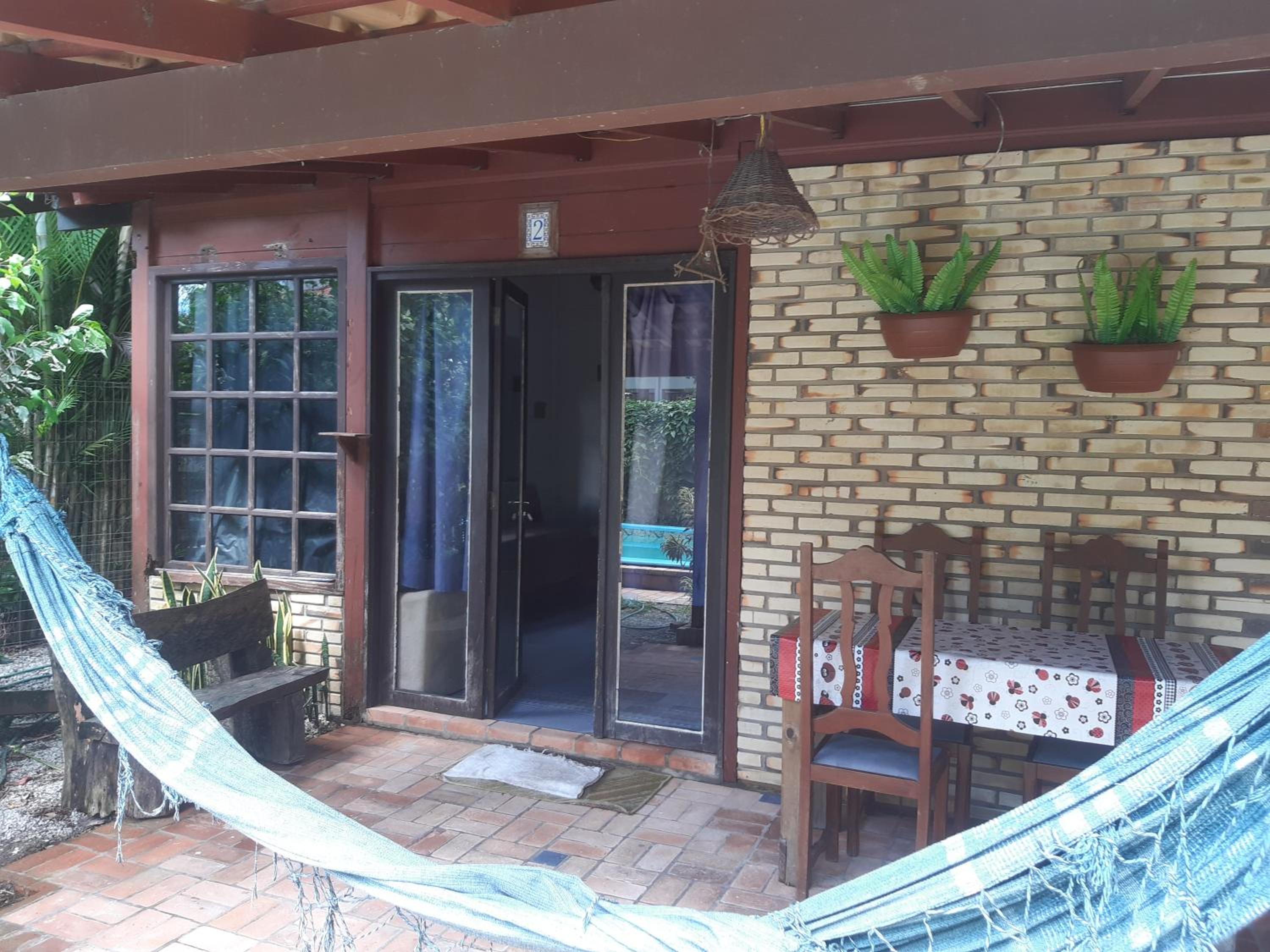Casa Rústica praia da Ferrugem próximo praia com piscina compartilhada