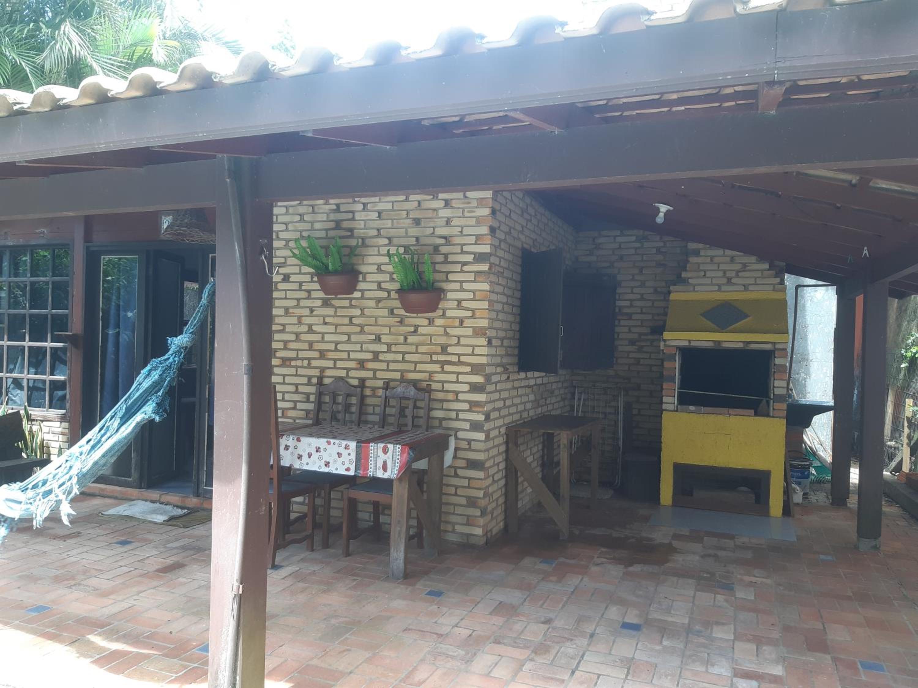 Casa Rústica praia da Ferrugem próximo praia com piscina compartilhada