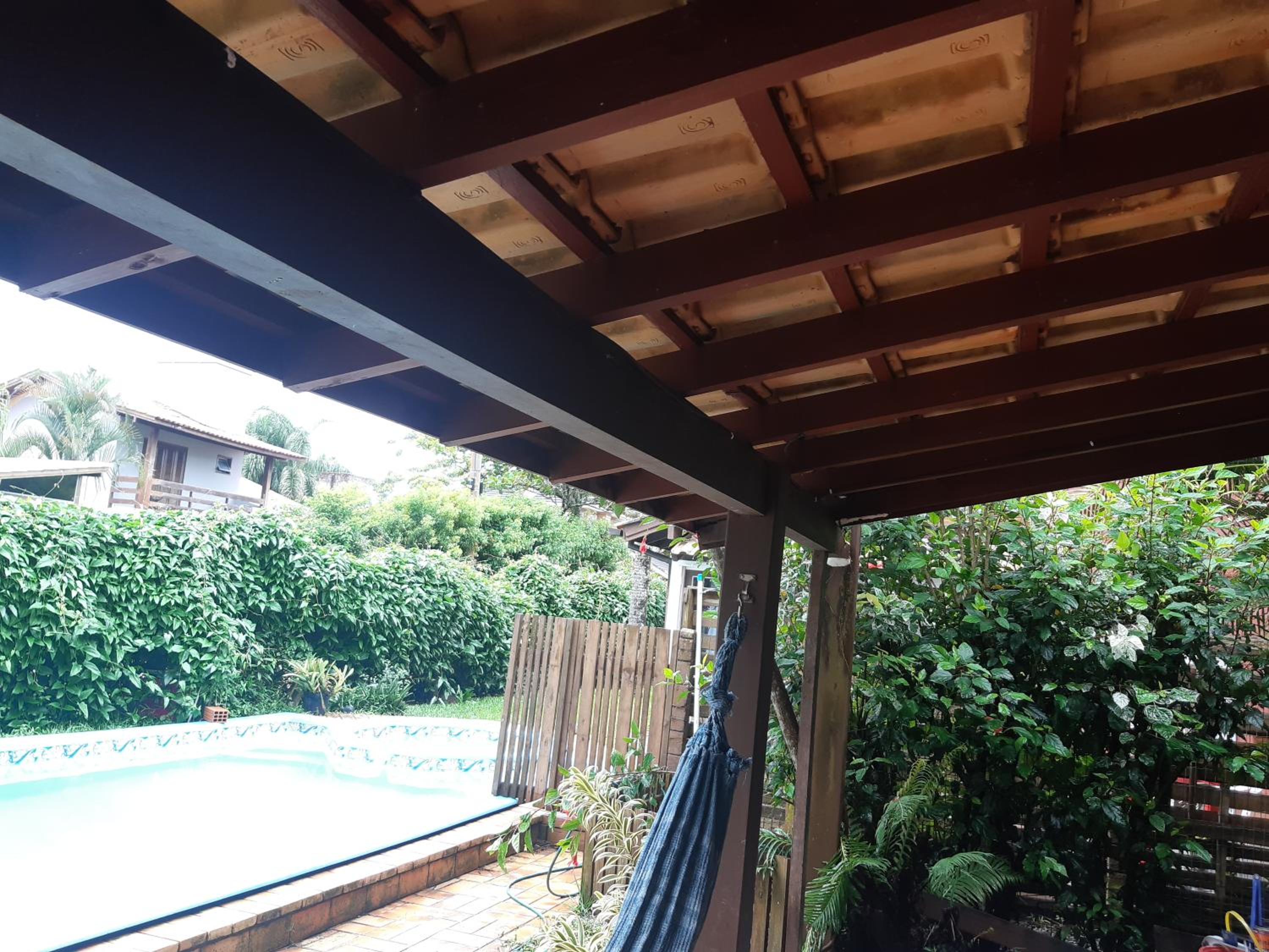 Casa Rústica praia da Ferrugem próximo praia com piscina compartilhada