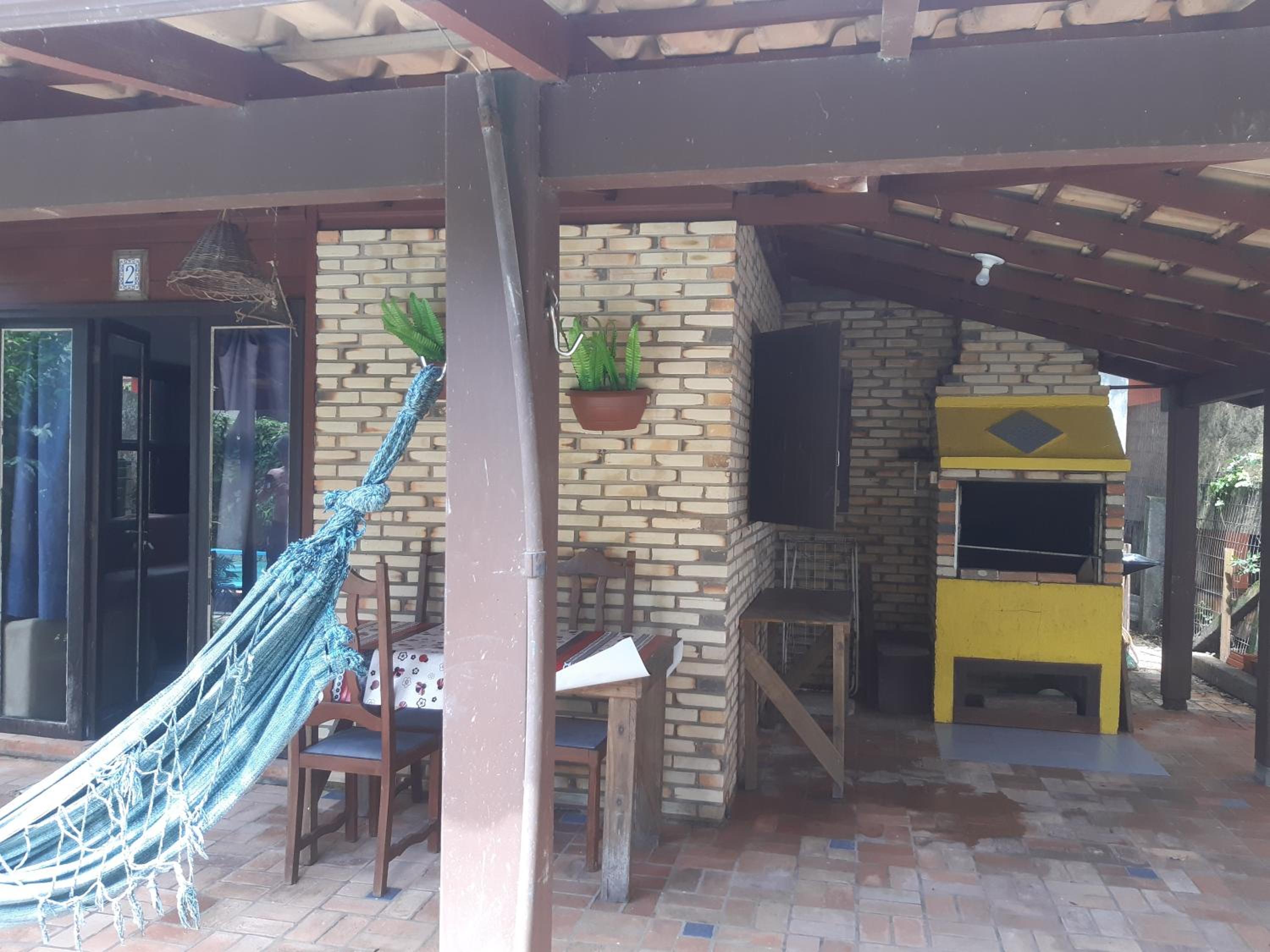 Casa Rústica praia da Ferrugem próximo praia com piscina compartilhada