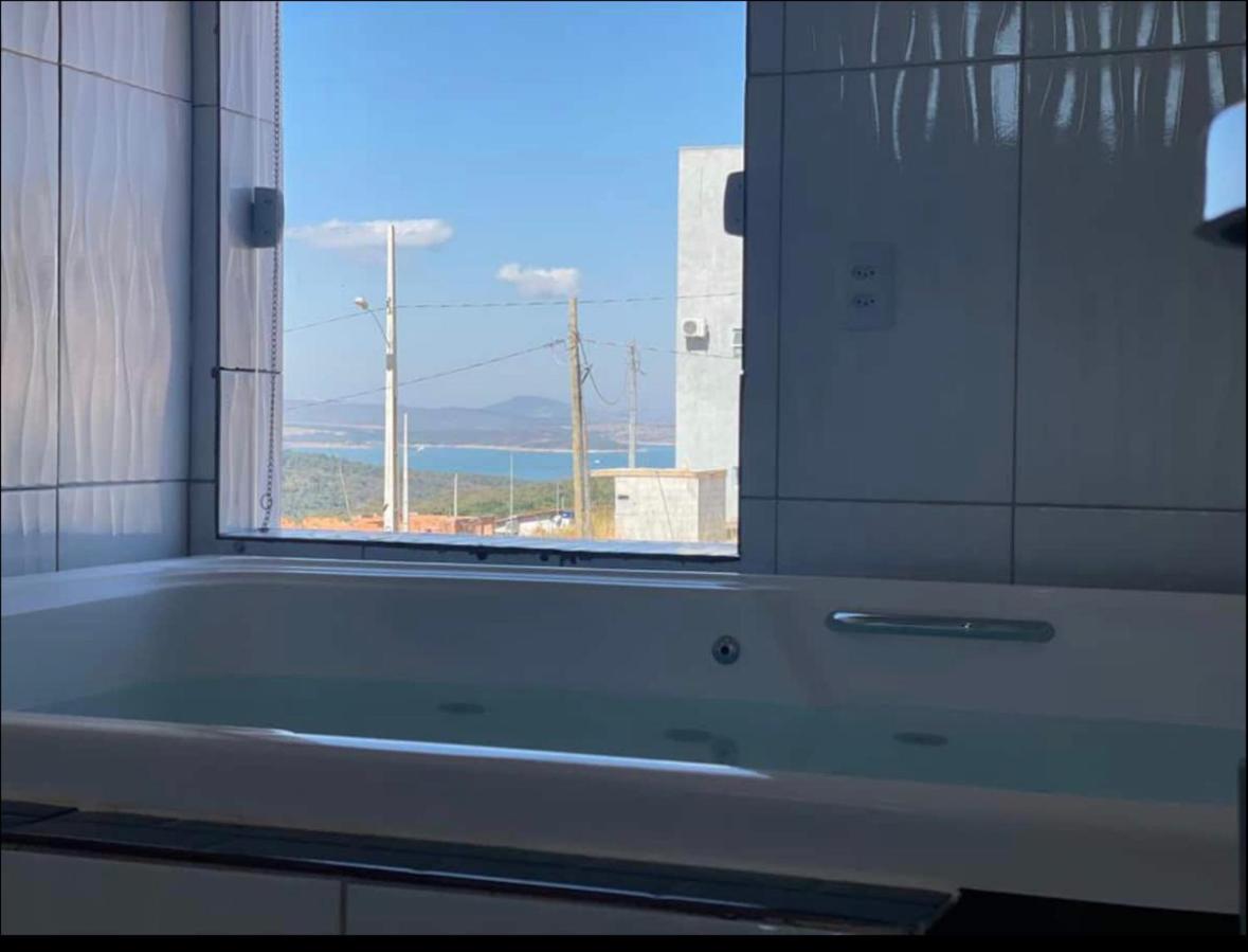 Casa com piscina Capitólio