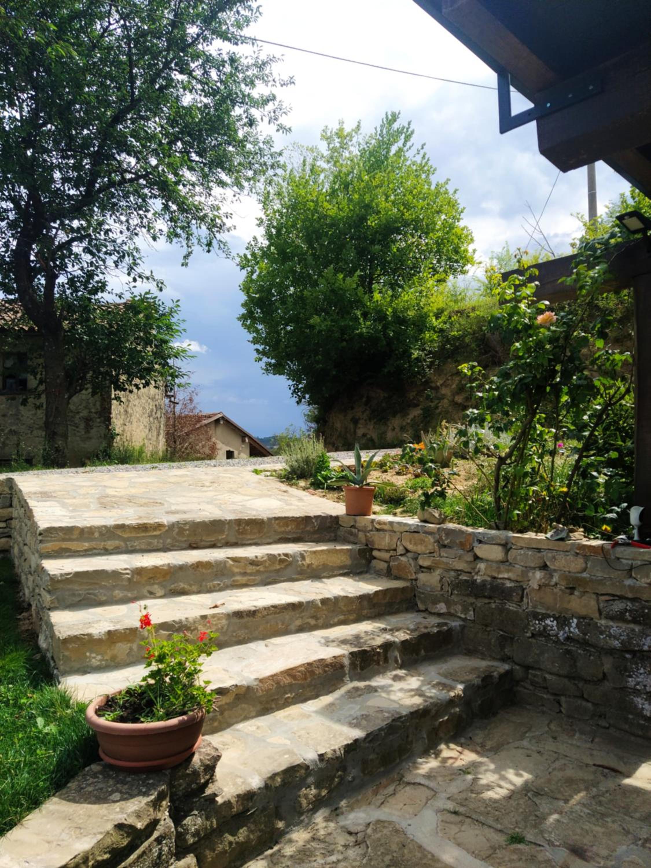 Country old stone house immerse in nature view 4