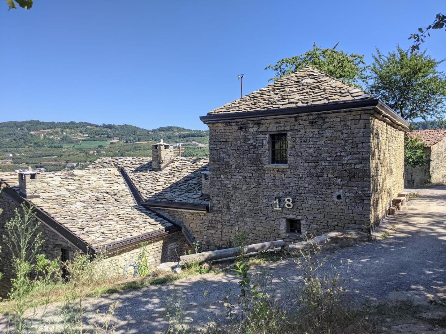 Country old stone house immerse in nature view 3