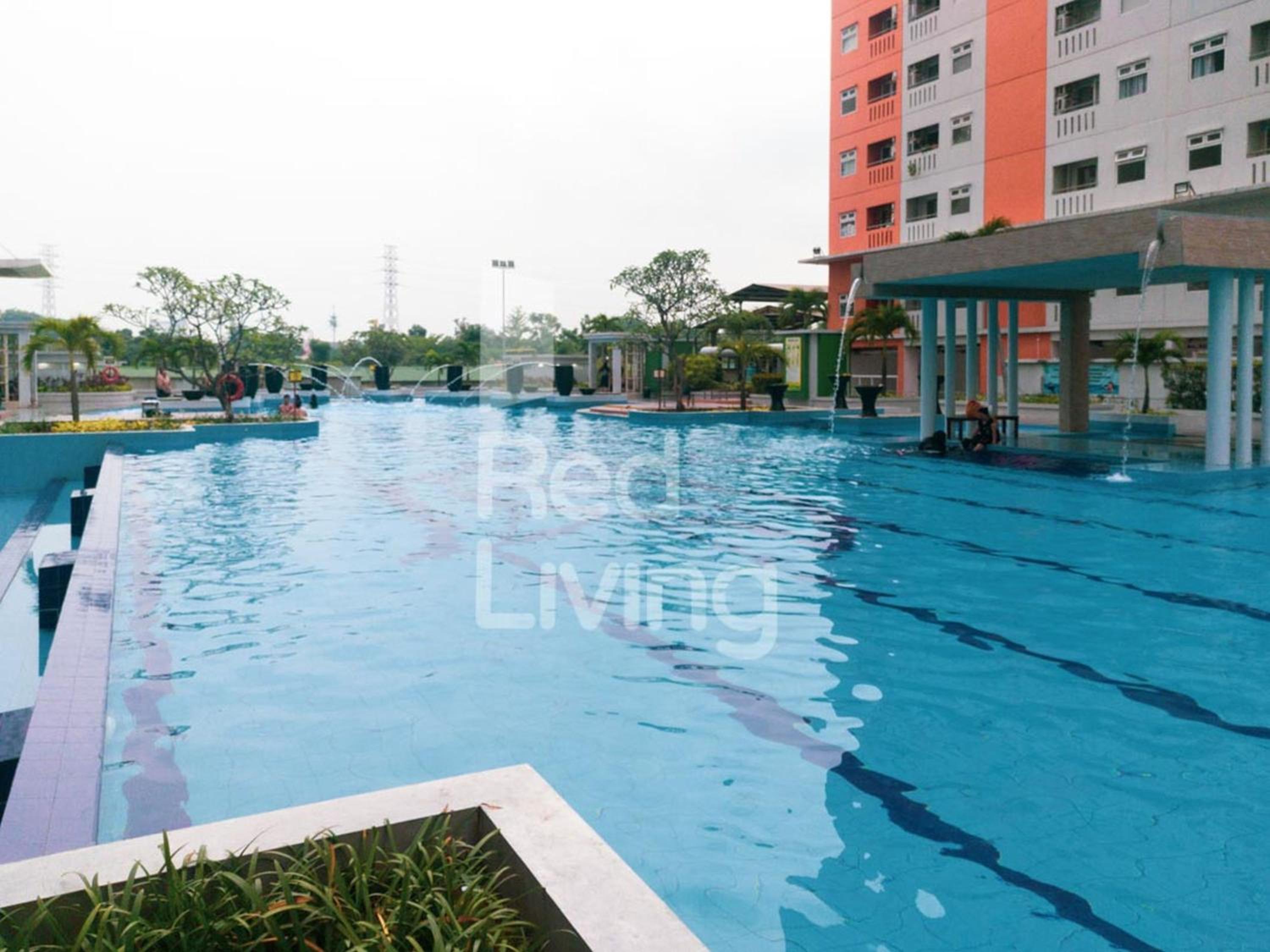 RedLiving Apartemen Green Pramuka - Family Group Tower Orchid view 3