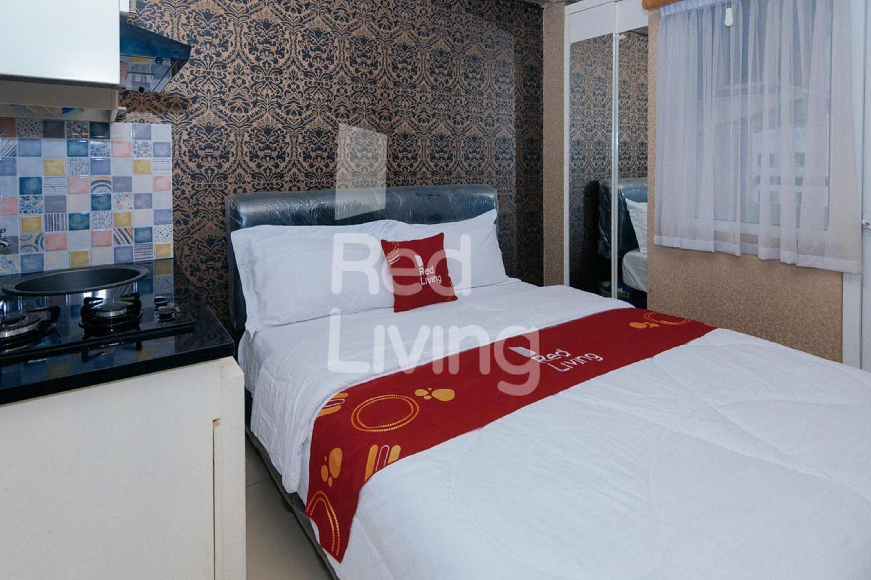 RedLiving Apartemen Green Pramuka - Family Group Tower Orchid view 4