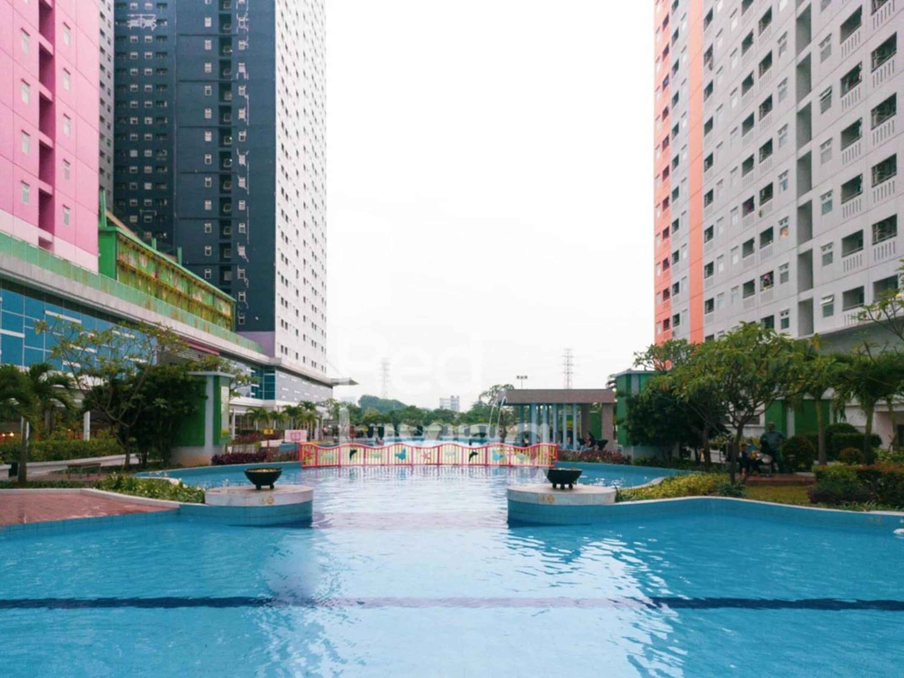 RedLiving Apartemen Green Pramuka - Family Group Tower Orchid view 5