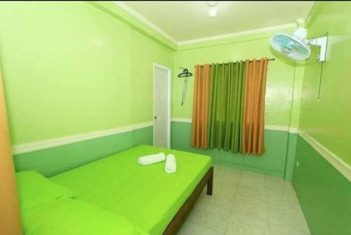 Santimart Backpackers Coron view 4