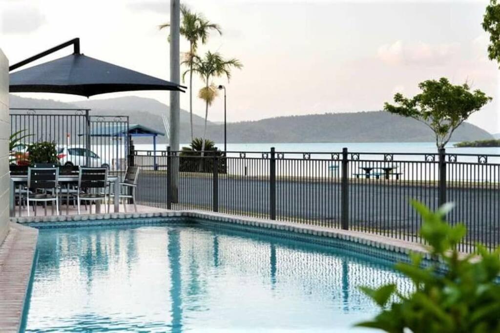 Little Coastal Haven apartment with a pool!