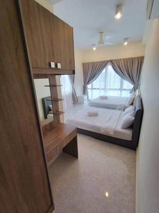 Deluxe Sunrise Suite 3 bedroom Loft B side seaview above Imago Shopping Mall photo 5