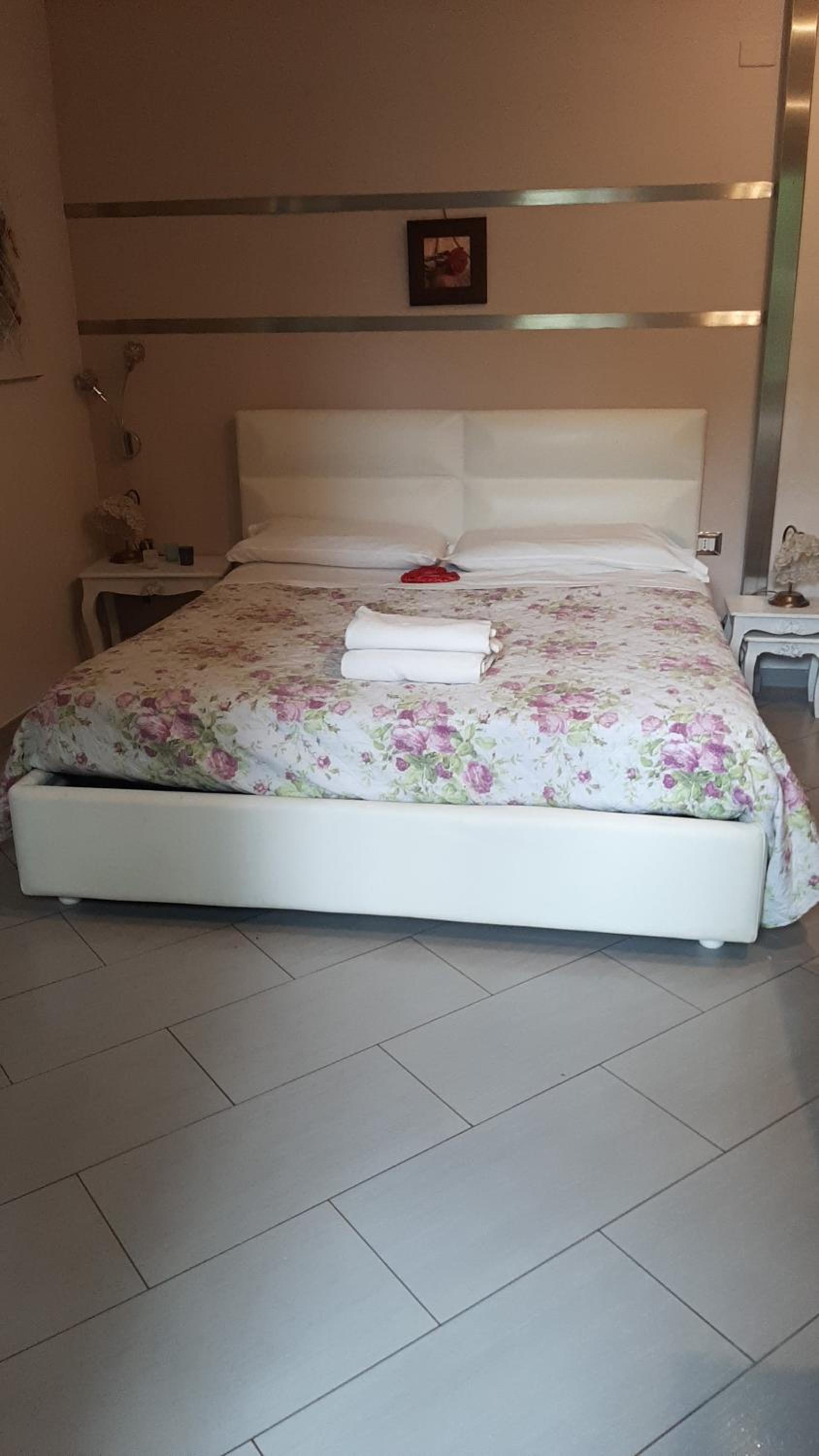 La Massaria B&B affittacamere riservatissimo en Salerno — bedroom