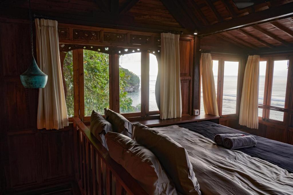 The Hidden Escapes- Unique Tiny Home on Bingin Beach with Breathtaking Ocean & Sunset Views view 3