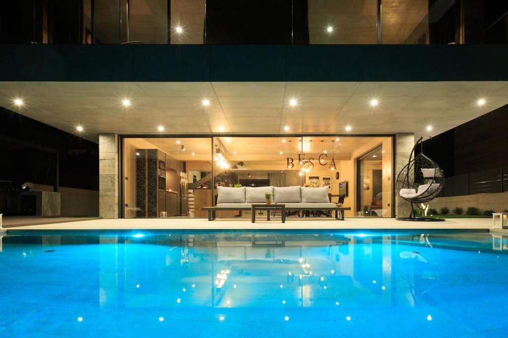 Villa Besca with heated infinity pool view 5
