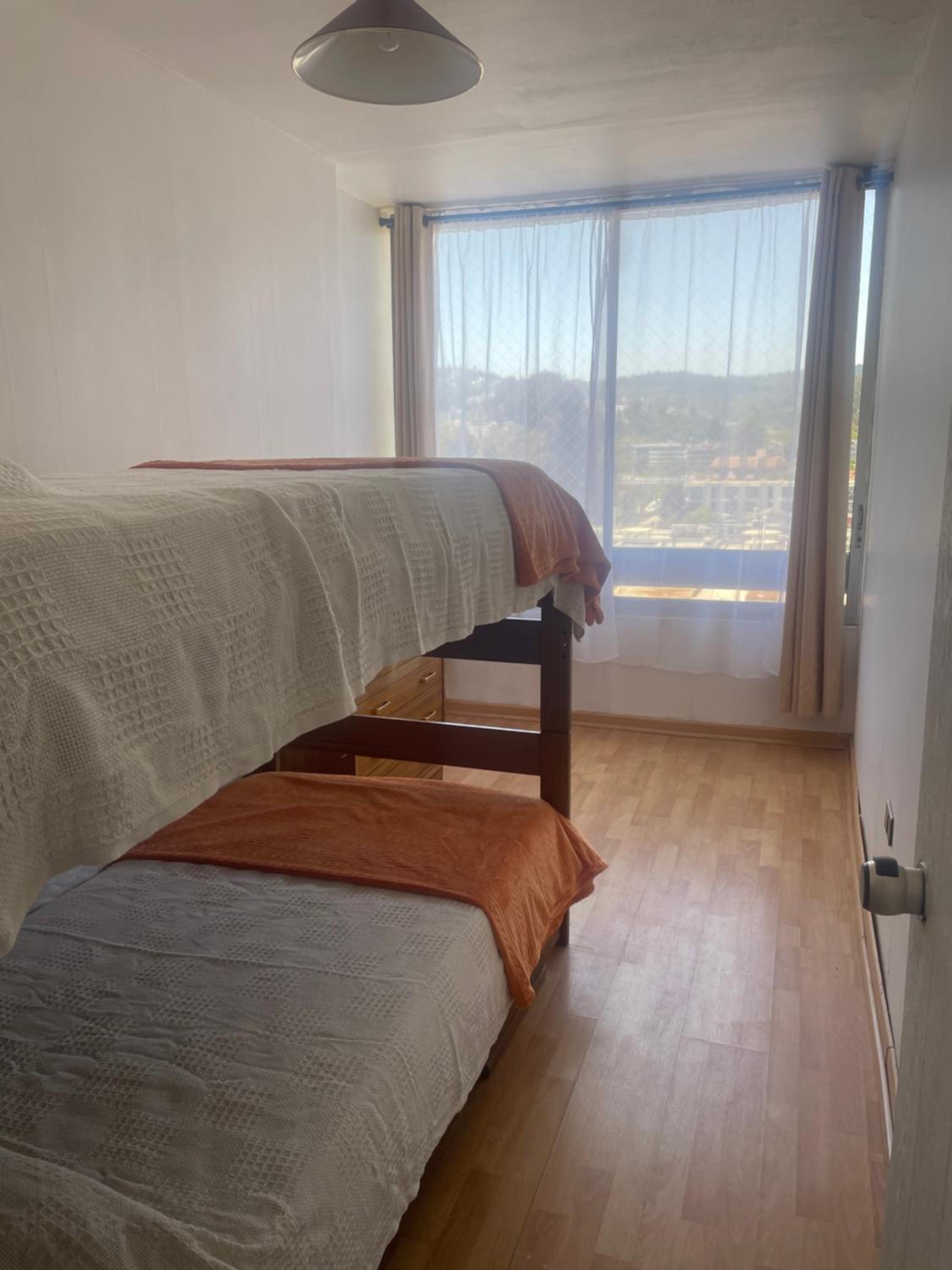 Departamento cerca de la playa y estacionamiento.