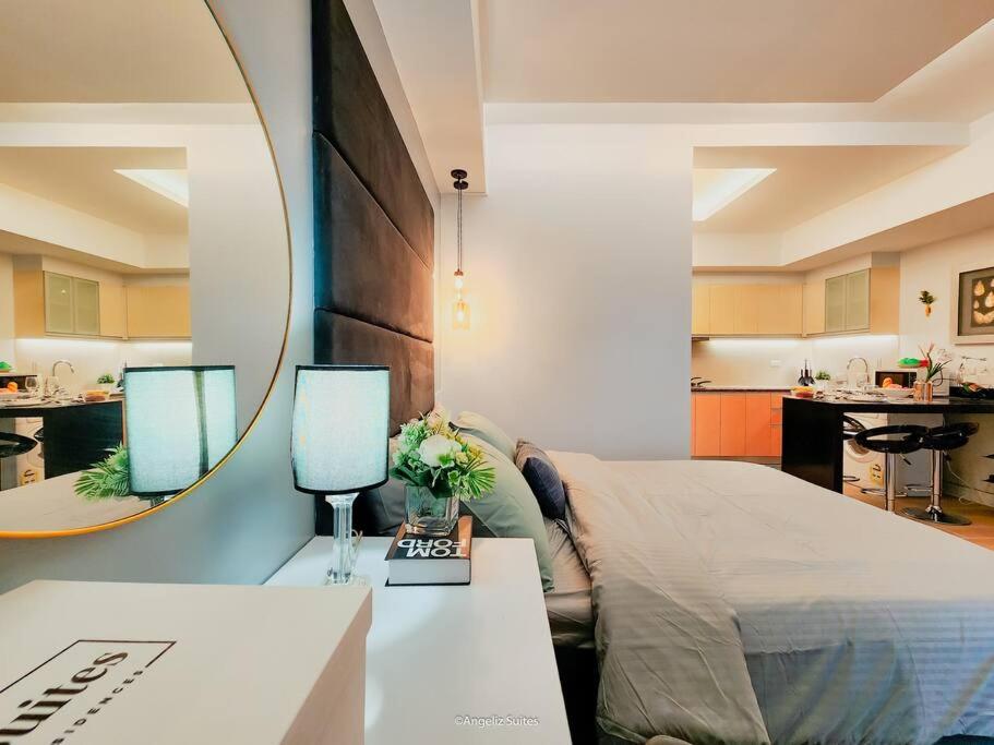 NEW Modern Venice Best View and Balcony, Fast Wifi at McKinley Hill 1BR interconnected to Venice Grand Canal Mall view 4