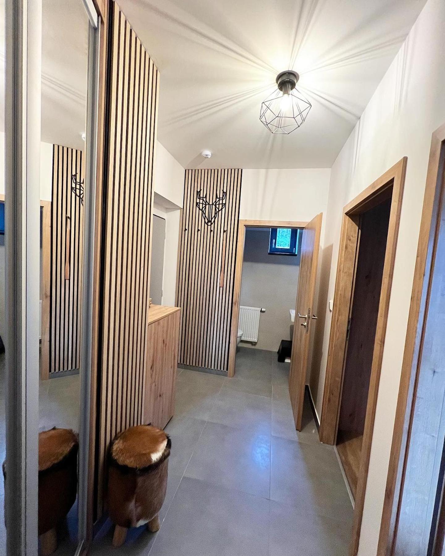 U jelena Harrachov - rodinný apartmán u lesa s garáží