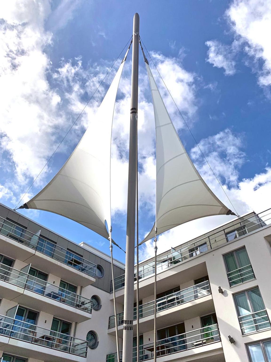 Apartment 25, Pier 25, Apartmenthaus Hafenspitze Blickrichtung offene SeeStrand